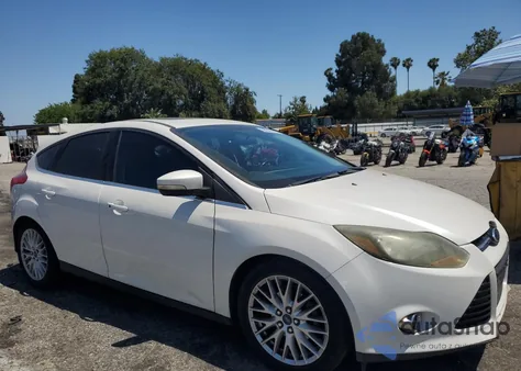 2014 Ford Focus Titanium z USA, uszkodzony, nr VIN 1FADP3N21EL264509